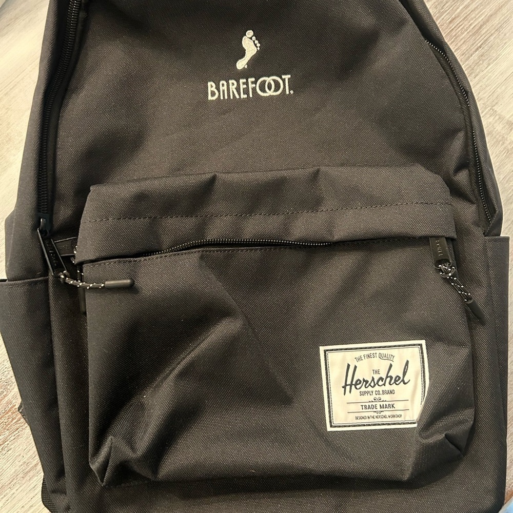 Herschel Supply Company Black Backpack for Men with Barefoot logo